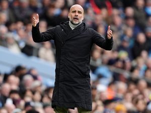 Manchester City manager Pep Guardiola shows his frustration on the touchline