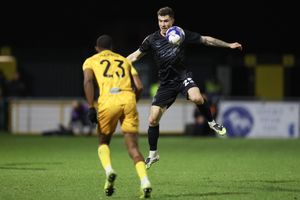 Josh Ruffels of Shrewsbury Town and Jayden Harris of Sutton United