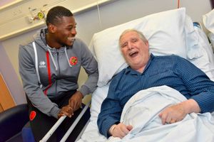 Amadou Bakayoko saying hello to big Walsall FC fan Gordon Morris