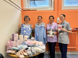 Tracey Stokes with staff of the Specialist Midwifery Team: Rebecca Emery, Zoe Smith and Philippa Abbis.

