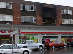 Supporting image for story: 50 firefighters at Stafford flats fire