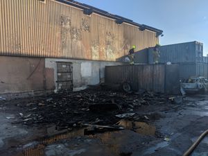 Supporting image for story: Cars caught in fire as arsonist targets industrial estate