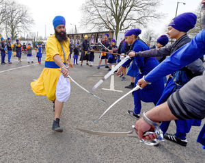 Sikhs demonstrate sword techniques