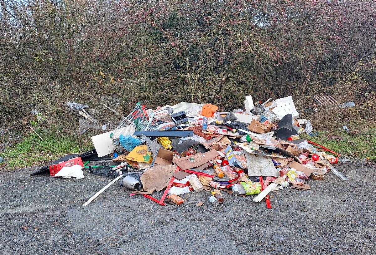 Fly-tippers have been issued with a fine after dumping a huge pile of rubbish in a Shropshire lay-by.