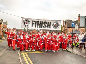 Supporting image for story: Santas stride out for festive charity dash