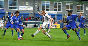 Tony Gray of AFC Telford United shoots at the Stalybridge Celtic goal