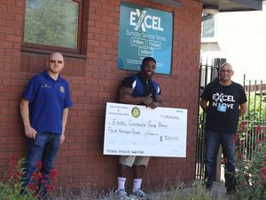 Supporting image for story: Bodybuilder gives back to community with food bank help