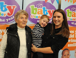 Winner of the 19 to 35 months category Billy Bushell, with mother Amy Jones and grandmother Gwenny Pitt