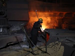 A steel worker at one of the blast furnaces at the British Steel site in Scunthorpe, North Lincolnshire