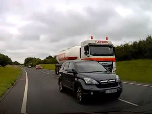 Supporting image for story: Caught on dashcam: Car inches from devastating crash as it overtakes on blind bend on A53 in Shropshire 

