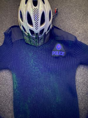 The spray marks clothing, and can be picked up by UV light