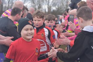 Sammy joined his team mates as they walked onto the pitch for their match, cheered on by the Vets teams