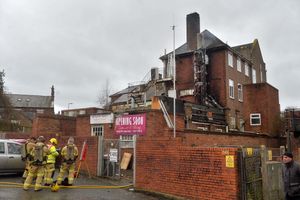 Firefighters dealing with the blaze at Kay's Lounge