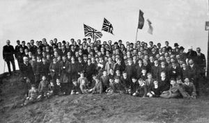 'Armistice Day, 1918' is the only thing written on the back of this photo among Great War memorabilia held in the archives of Wrekin College, or Wellington College as it was known at that time of the photo. Armistice gathering at the top of The Wrekin on November 12, 1918, the day after the Armistice was signed, with that day being declared a school holiday. 'After a service in the school the whole school set out to climb The Wrekin...' The founder of the college, John Bayley, is at the left hand end of the second row. Great War. 1914 to 1918 war