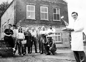 Malcolm (right) with fellow volunteers from organisations in the town, all set to start painting Cosy Hall, at Water Lane, Newport, in 1985 - the building was being turned into a community hall