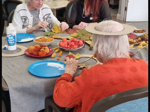 Supporting image for story: Care home residents welcome autumn with creative wreath-making workshop