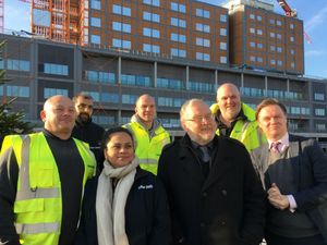 John Spellar and Toby Lewis with construction workers on the Midland Metropolitan hospital site 