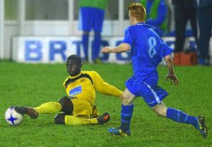 Nuha Jabbi of Wellington and Kevin Buxton of Bridgnorth in action