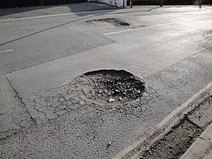 Supporting image for story: Few ‘ankle breaker pot holes’ at a Builth Wells car park, a town councillor has warned