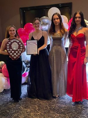 Julia Cohen (left) holding the teachers shield, followed by (left to right) Matilda Taylor, Izzy Marsh and Amelie Brookes who received their student letters.