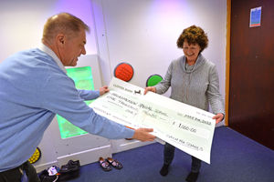 Broadmeadow Special School in Wolverhampton came in fifth place and won £1,000. Pictured: assistant headteacher Dawn Beamer with students and sponsors.