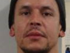 Supporting image for story: £3,000 reward offered in hunt for stabbing and kidnapping suspect