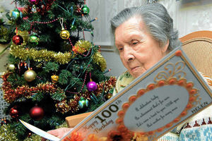 Helen Palmer-Blundell reads through one of her cards as she celebrates her 100th birthday at Roden Hall Care Home