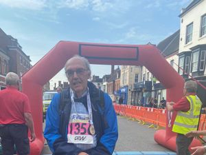 Supporting image for story: Best foot forward for 87-year-old man who has just finished 22-mile challenge for the second time