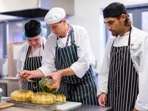 Andy, centre, with Telford College students