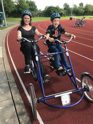 Claire and Sam try out a side-by-side adapted trike.