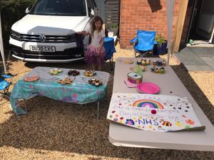 Supporting image for story: Shrewsbury six-year-old Suraiya raises money for the NHS with driveway cake sale