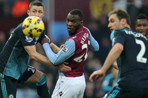 Christian Benteke of Aston Villa sees his header go the wrong side of the goal.