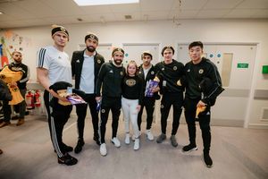 Wolves stars with Charlie Stokes, 11