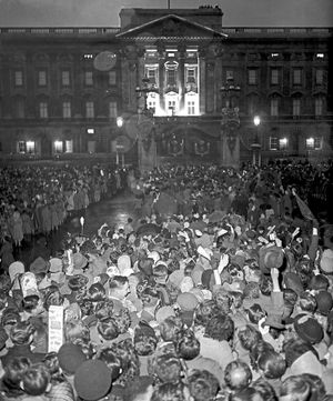 Huge crowds assemble outside Buckingham Palace after the Coronation ceremony, braving cool conditions and outbreaks of heavy rain to celebrate