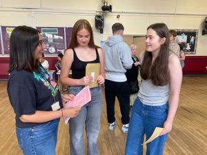 Miss Karan Muneer celebrating Esme Buttrick's and Ruby Milner's results