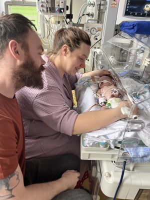Mum Keri and dad Andy with little Patrick shortly after birth. 