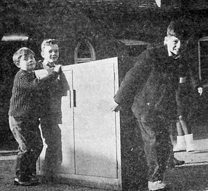 St Mary's Bluecoat CofE School, Hospital Street, Bridgnorth, pictured on Tuesday, December 7, 1965 - the day it was evacuated following an architect's report saying the structure was in such bad condition that it could collapse or partially collapse in some circumstances. The caption: 'Moving out day. Pupils help to move furniture out of the 'slum' school.' It seems that it effectively closed. The building dated from 1847 and was demolished in June 1970. 