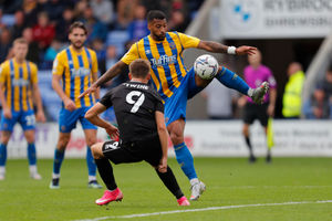 David Davis of Shrewsbury Town and Scott Twine of MK Dons (AMA)
