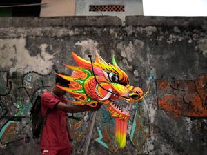 Supporting image for story: In Pictures: Indonesia welcomes the Year of the Snake with dragons and drums