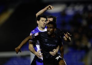 Kevin Berkoe battles for the ball against Bristol Rovers