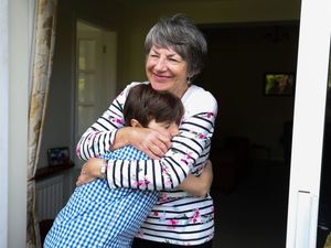 Supporting image for story: Public urged to socialise outside, keep their distance and ‘hug cautiously’