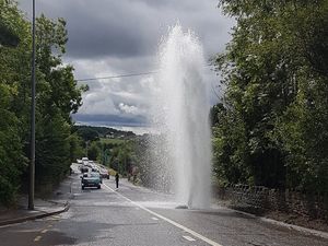 Supporting image for story: Temporary A5 traffic lights as burst main sprays water 20ft high