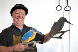 Watch the birdie – Paul with one of his designs