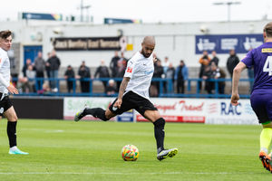 Byron Moore brings the ball into the box and fires a shot (Kieran Griffin)