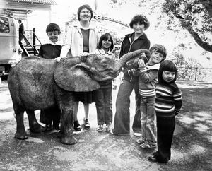 Morning milk time for Estar, Dudley Zoo's baby elephant, as she meets young Express & Star readers who helped choose her name. Pictured with Estar are the five winners of our name the elephant contest, Claire and Michael Thornton, of Muirfield Crescent, Tividale; Margaret Levans (CORRECT), of Laurel Road, Dudley; Timothy Evans, of Graham Road, Wordsley; and Lesley Darose, of Daywell Rise, Rugeley; with runner-up Karen Reece of Pedmore Road, Woodside, Dudley. The prize was a day out today at both Dudley and Bristol zoos. Estar, who was bought for Dudley zoo by the Express & Star, is an orphan from South Africa.