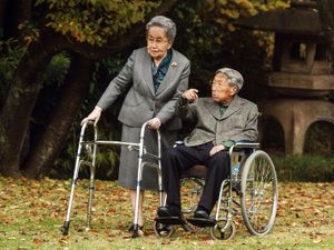 Japanese Prince Mikasa, right, and his wife Princess Yuriko talk at their residence in Tokyo in 2015