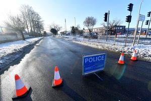 Police at the scene of the collision on the A449 Stafford Road. Photo: Tim Thursfield