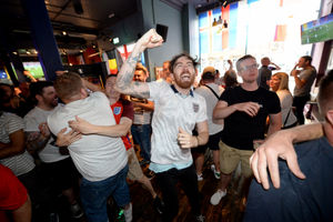 Fans celebrate England going 1-0 up at the Royal London pub, Wolverhampton