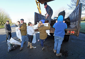 Bridgnorth Young Farmers Club members were on hand to dish out the muck during the charity 'Muck Lug' at Bridgnorth Livestock Market..