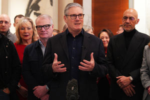 Prime Minister Sir Keir Starmer (centre) speaks to members of a business delegation in Beijing, during his visit to China, with Richard Parker to the left.
